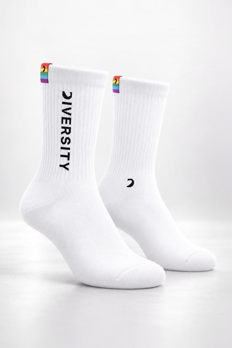 White unisex Diversity socks, black DIVERSITY logo and rainbow flag tag
