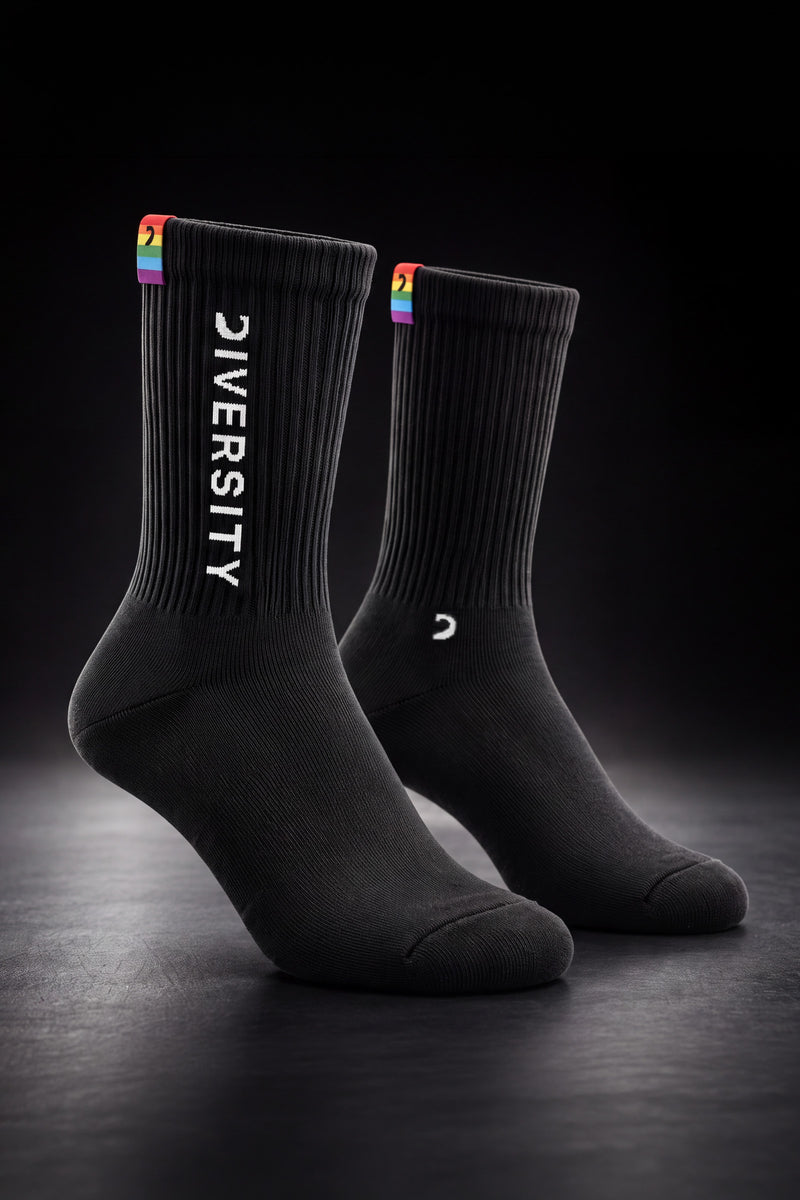 Black unisex Diversity socks, white DIVERSITY logo and rainbow flag tag