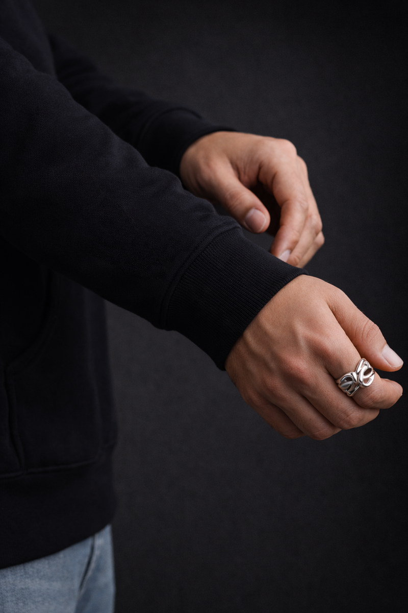 No-flag option (ally): sleeve of a black midweight piece without embroidery